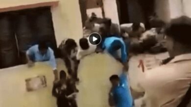 suicide-attempt-in-bengaluru-watch-video-couple-pours-petrol-on-body-police-and-neighbors-save-life-by-pulling-over-wall